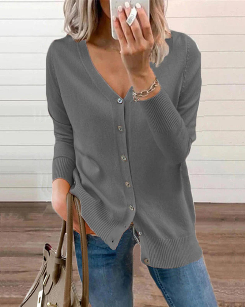 Blusa tricotada lisa con cierre de botones y escote en V para mujeres