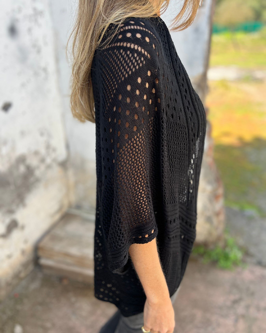 Abrigo elegante con diseño de punto calado