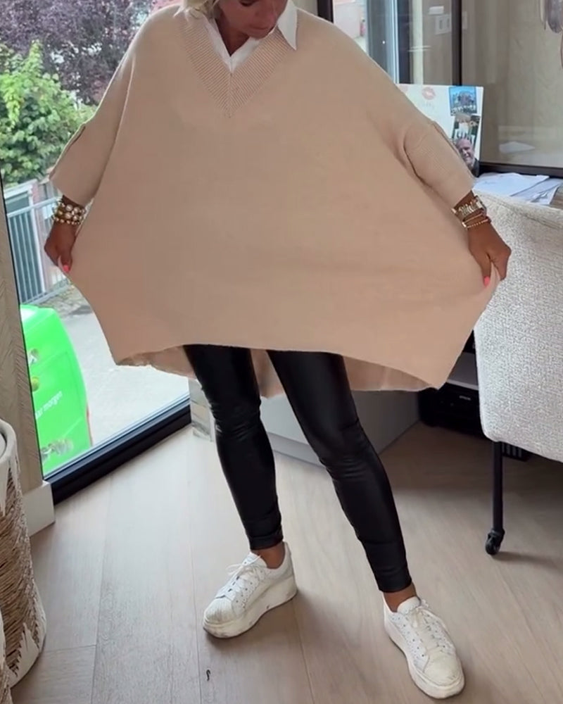 Pull con cuello en V, buttons y diseño asimétrico