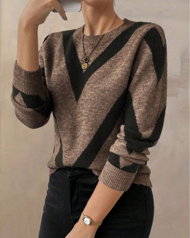 Blusa con características impresas de geometría y cuello redondo