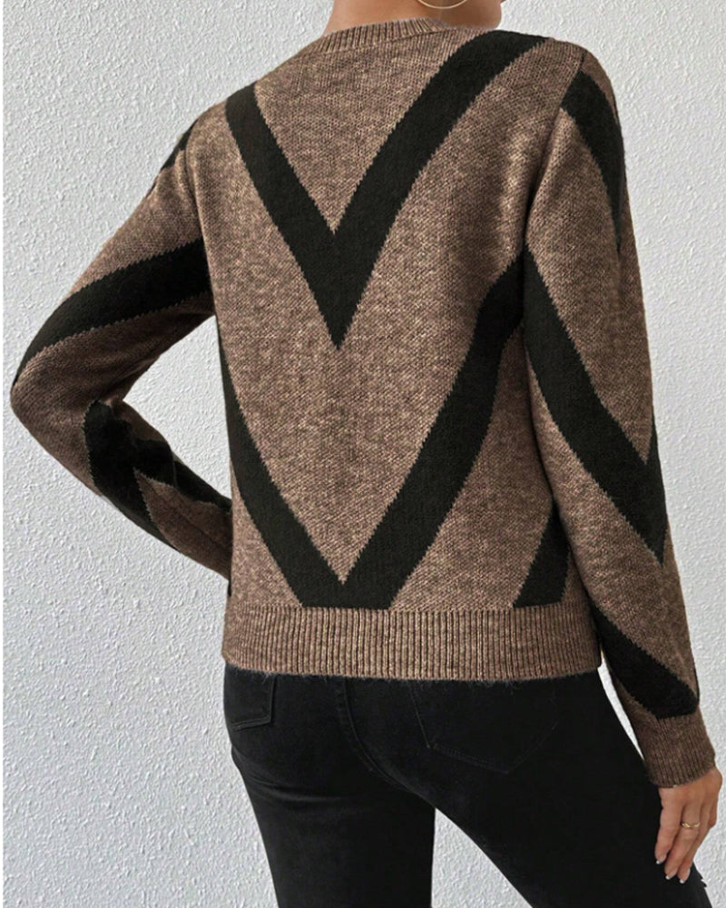 Blusa con características impresas de geometría y cuello redondo