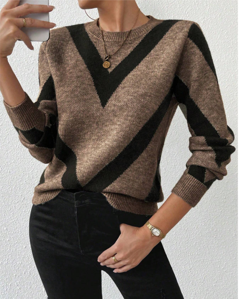 Blusa con características impresas de geometría y cuello redondo