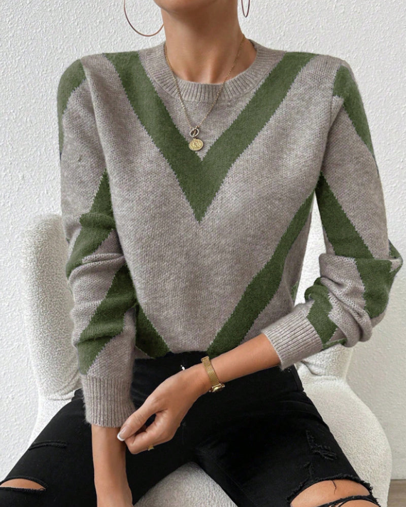 Blusa con características impresas de geometría y cuello redondo