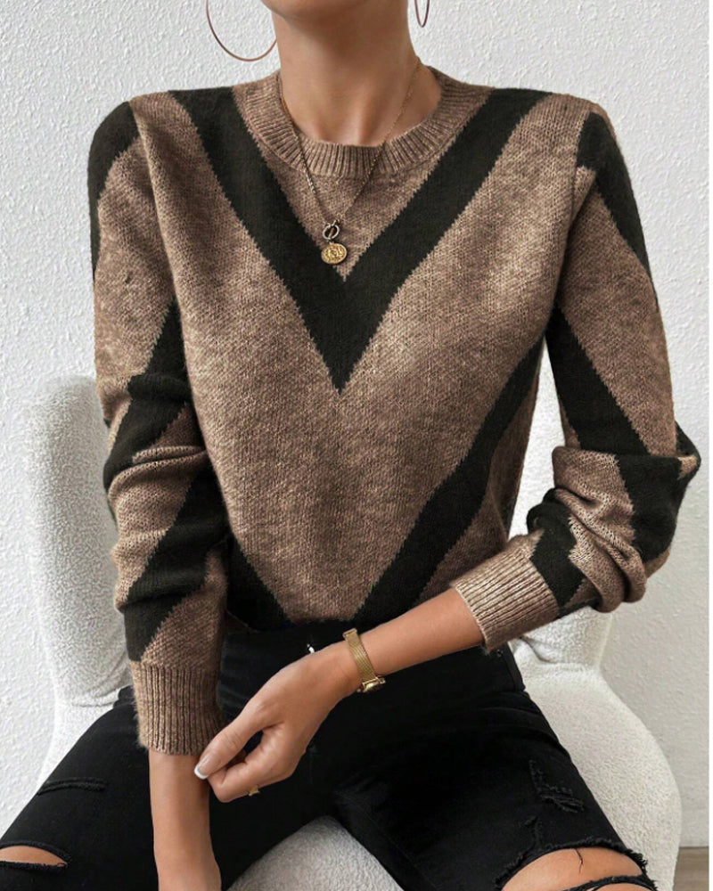 Blusa con características impresas de geometría y cuello redondo