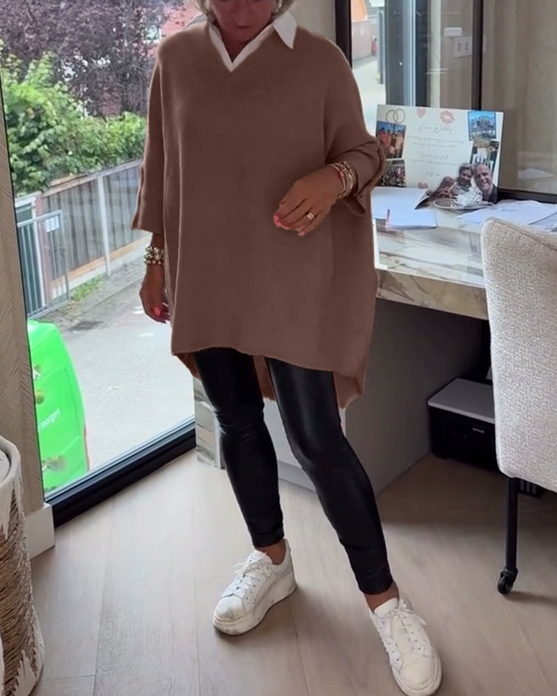 Pull con cuello en V, buttons y diseño asimétrico