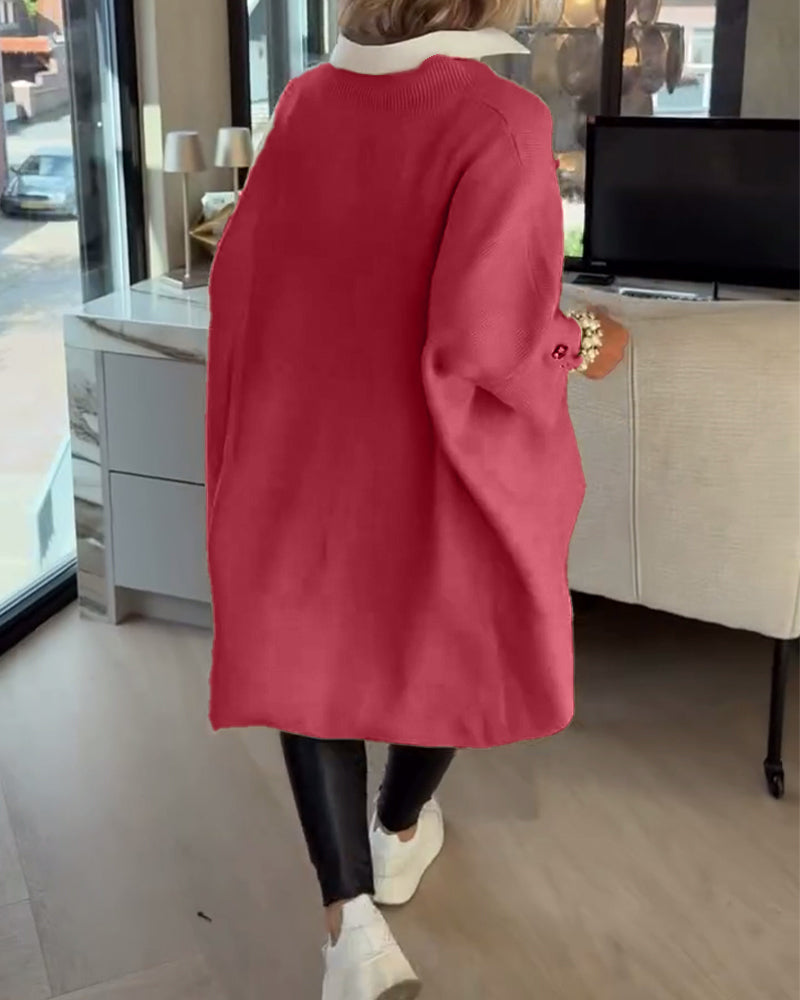 Pull con cuello en V, buttons y diseño asimétrico