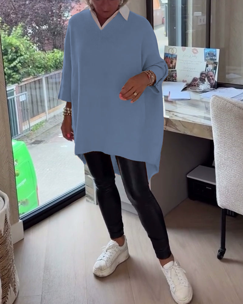 Pull con cuello en V, buttons y diseño asimétrico