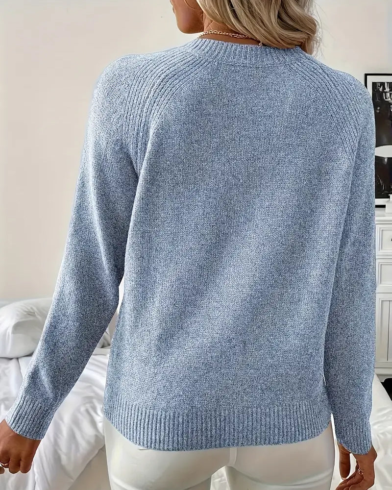 Camisa de manga raglán decorada con botón en la parte superior