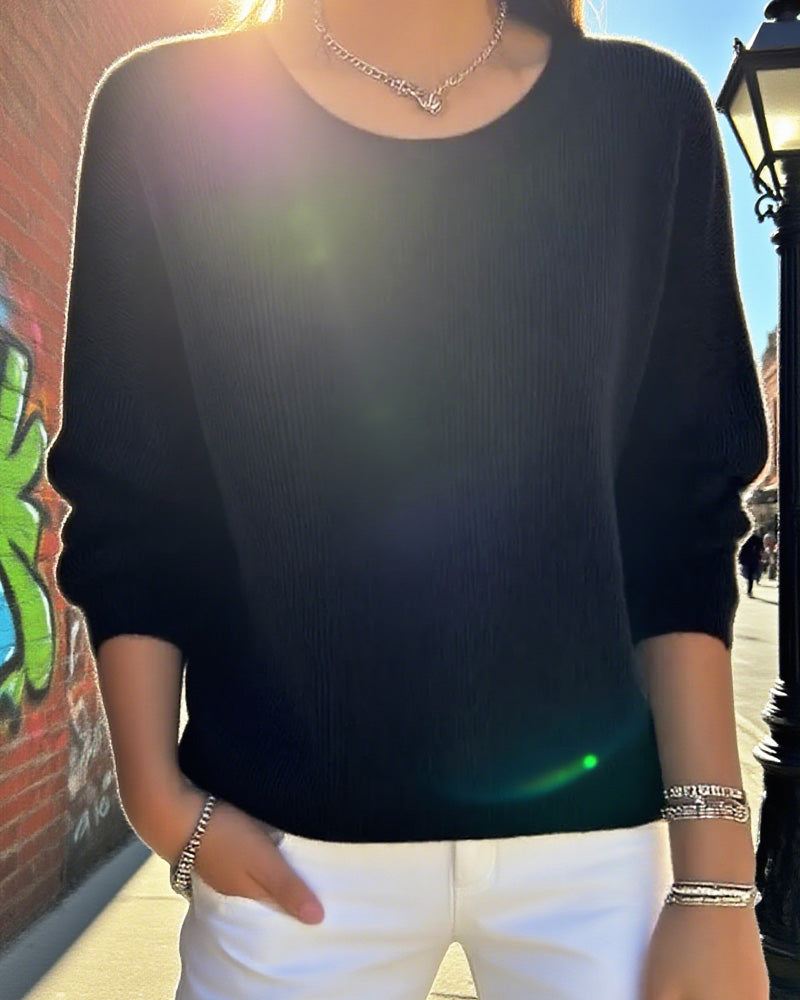 Pull uni de cuello redondo con hombros caídos