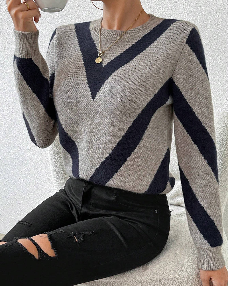 Blusa con características impresas de geometría y cuello redondo