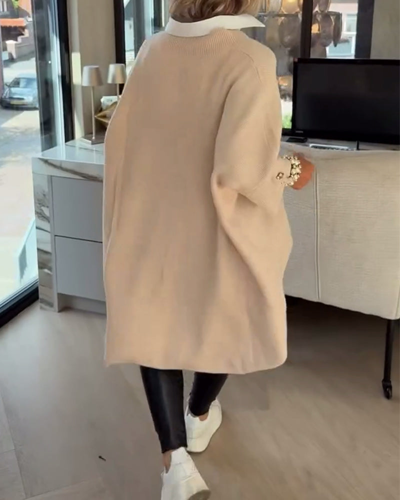 Pull con cuello en V, buttons y diseño asimétrico