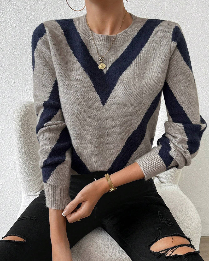 Blusa con características impresas de geometría y cuello redondo