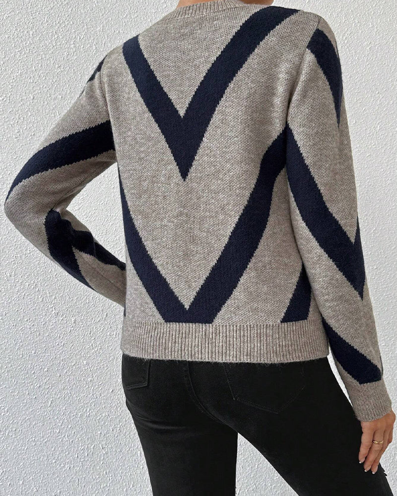Blusa con características impresas de geometría y cuello redondo
